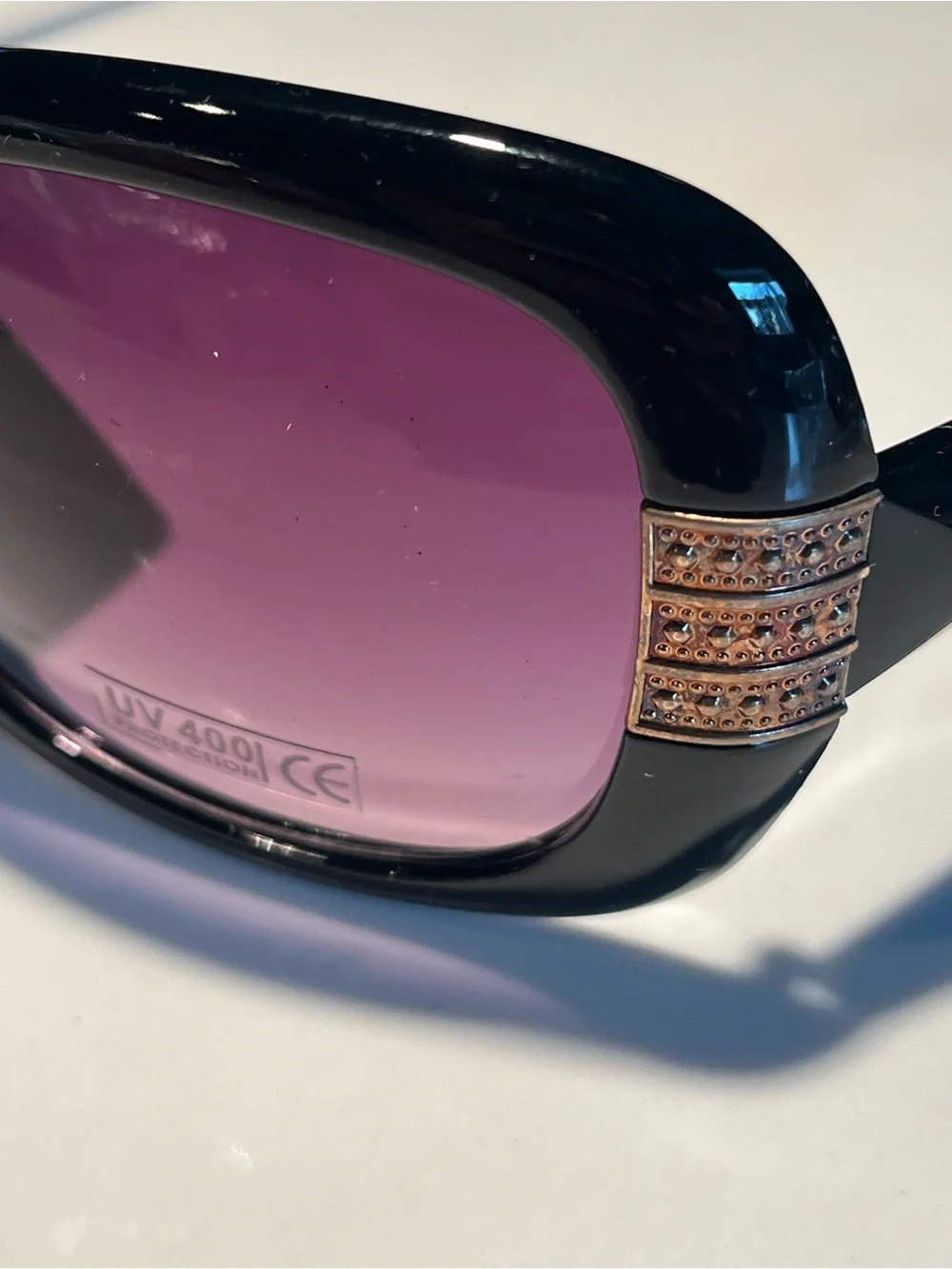 NWT fabulous oversized black sunglasses with gold tone design on front & sides.